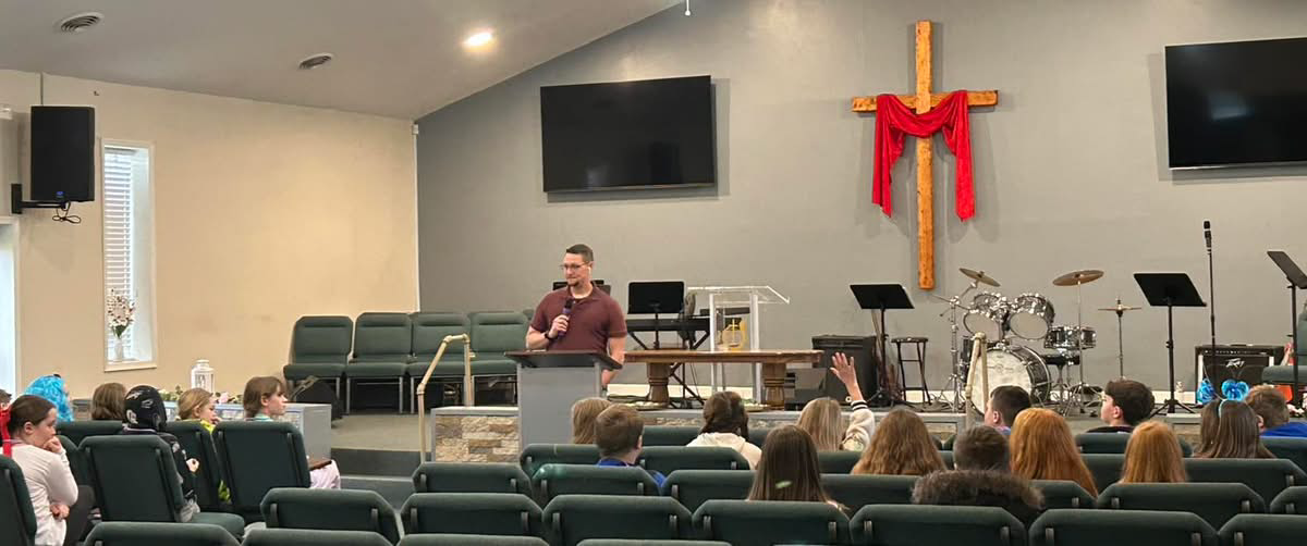 Students participating in a Bible lesson